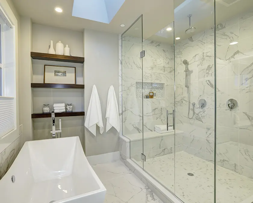 Bright White Bathroom by Mountaineer Tile & Remodeling