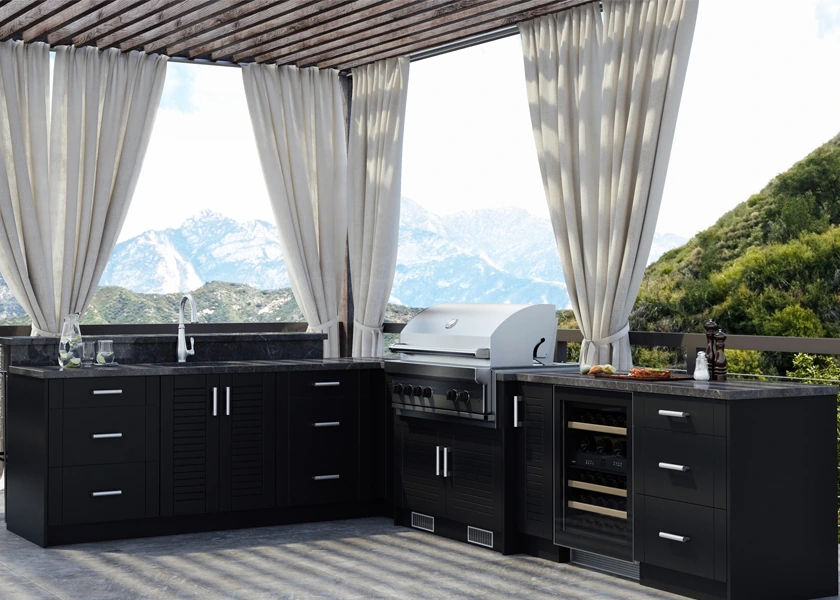 Outdoor kitchen with a full cooking and prep run